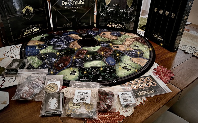 The physical Return to Dark Tower board and expansions, with the reference data extracted from it overlaid as a graph